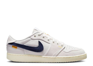 white nike roster dunks with gum bottom blue jeans pants